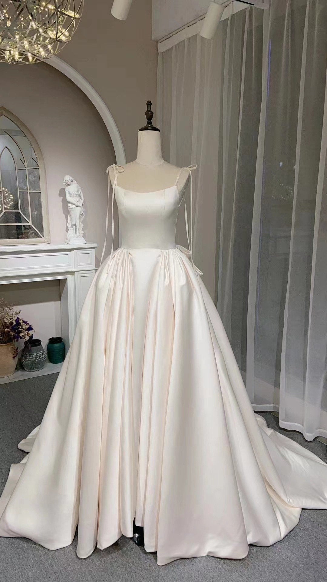 Lilibet | Ivory satin corset custom wedding dress with bow, unique min Shindig Threads Lilibet | Ivory satin corset custom wedding dress with bow, unique min Shindig Threads