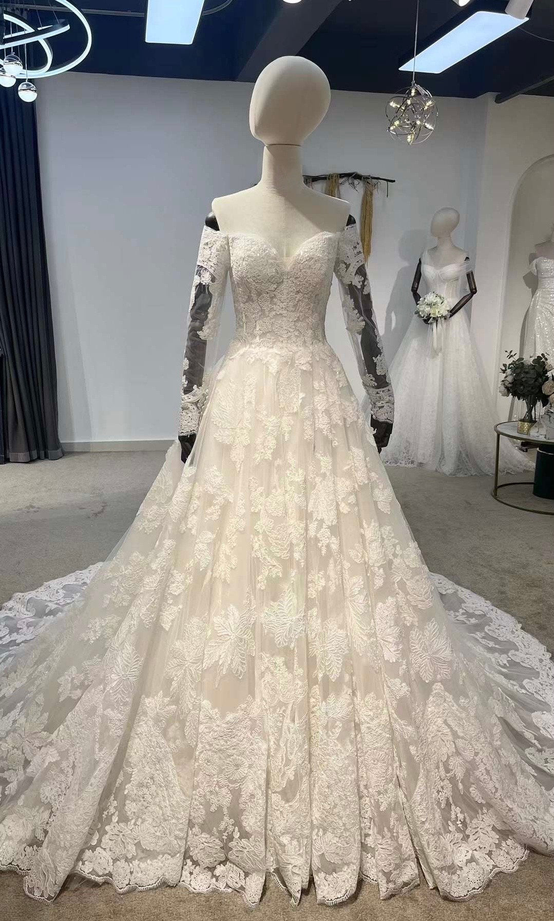 Long sleeve off the shoulder lace wedding dress, romantic princess bal Shindig Threads Long sleeve off the shoulder lace wedding dress, romantic princess bal Shindig Threads