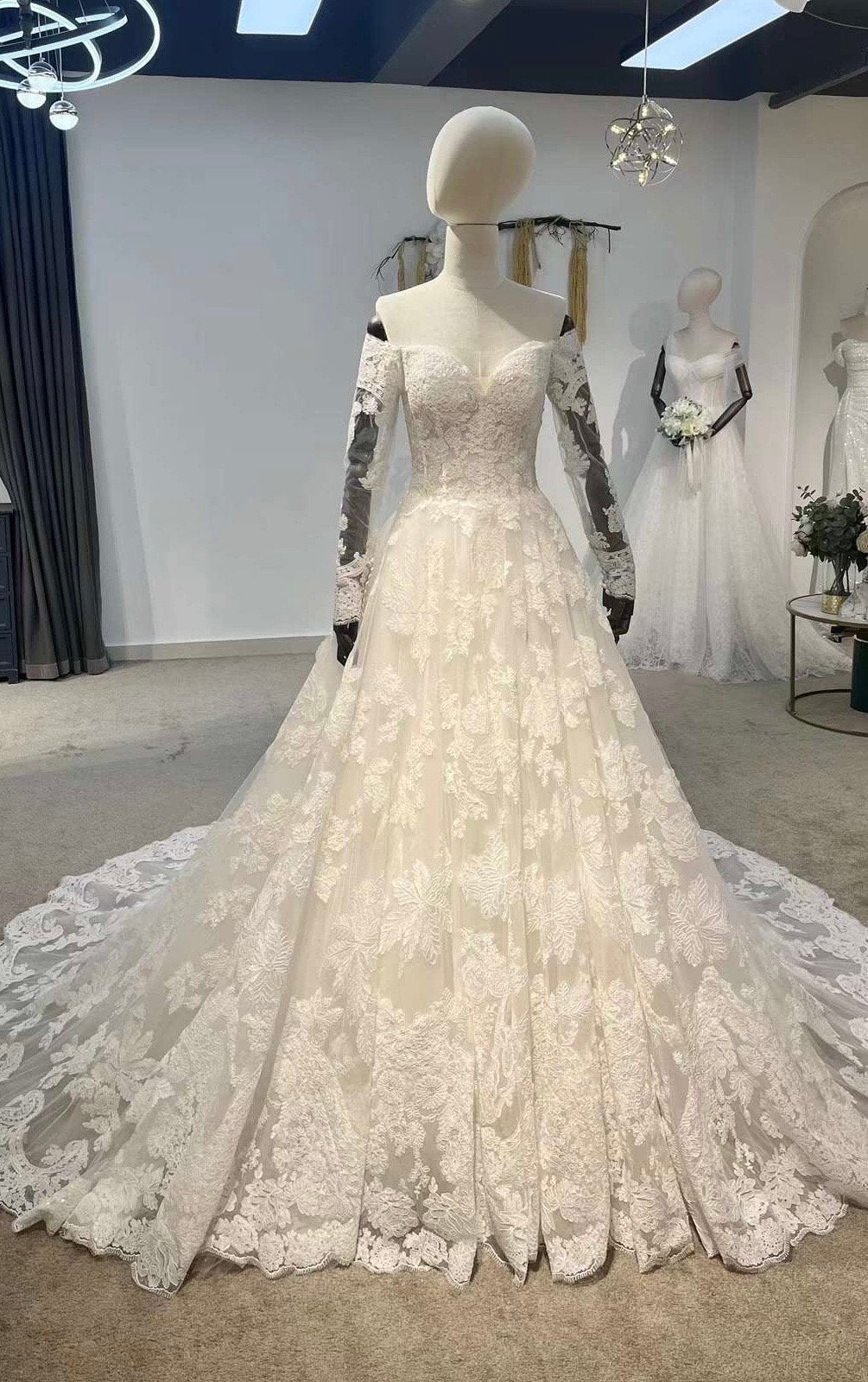 Long sleeve off the shoulder lace wedding dress, romantic princess bal Shindig Threads Long sleeve off the shoulder lace wedding dress, romantic princess bal Shindig Threads